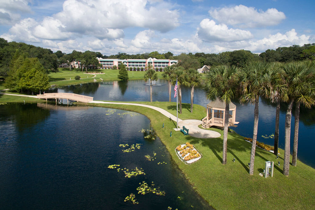 John Knox Village of Central Florida's pavilion by the water on a sunny day.